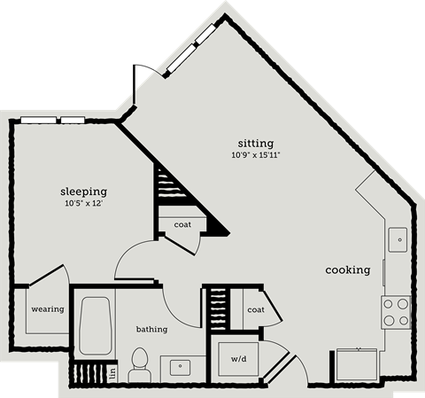 a floor plan of a house shaped like a barn with bedrooms and a living room